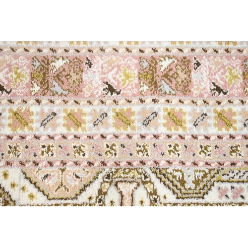 606 - Moroccan Pink and Cream Ground Wool Rug with stylised geometric pattern, 184cm x 126cm