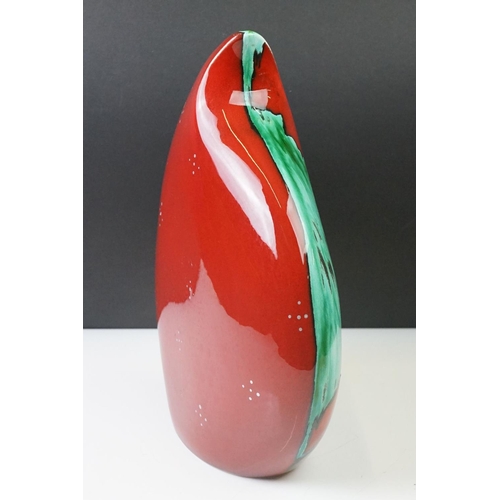 15 - Anita Harris ' Teardrop ' vase with floral decoration and mottled red ground, 31cm high