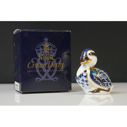 16 - Four Boxed Royal Crown Derby paperweights to include Collectors Guild Exclusive Molly (gold stopper)... 