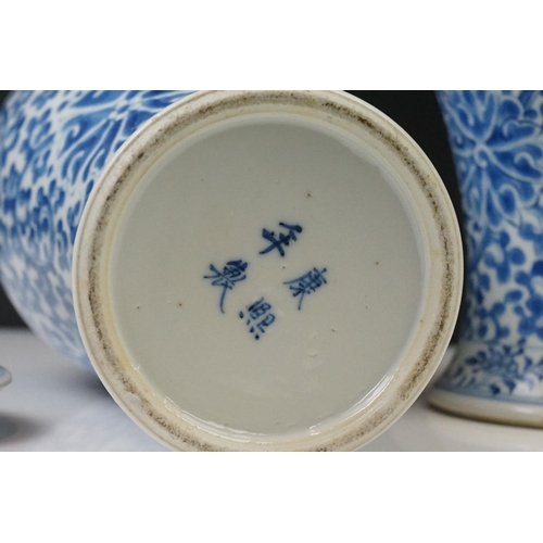 20 - Near Pair of Chinese Blue and White vases & covers, of baluster form, with scrolling foliate & flora... 