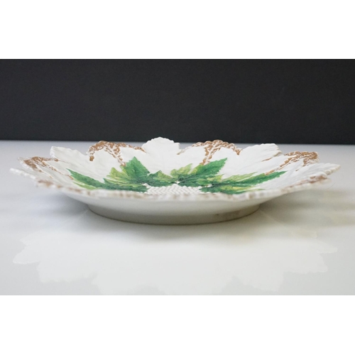 30 - Early 20th century Meissen relief moulded vine leaf cabinet plate, in green and gilt, crossed swords... 