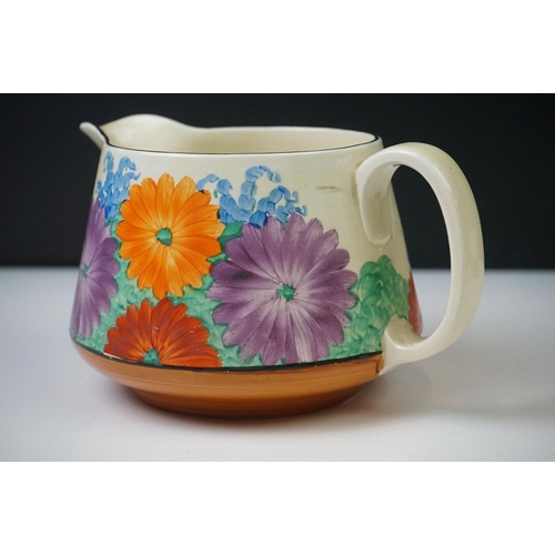 4 - Clarice Cliff for Newport Pottery ' Gayday ' pattern crown jug, 11cm high, together with a Clarice C... 