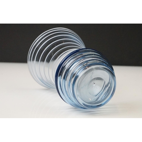 46 - Three coloured studio glass vases with ribbed design and ground pontils (featuring a blue tinted exa... 