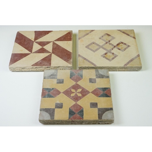 72 - Three French / Italian encaustic floor tiles of geometric design, measure approx 20cm x 20cm