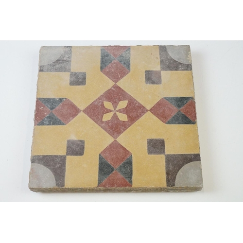 72 - Three French / Italian encaustic floor tiles of geometric design, measure approx 20cm x 20cm