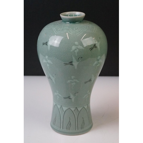 75 - Korean Goryeo Celadon Glazed Baluster Vase decorated with cranes and clouds (23cm high), together wi... 