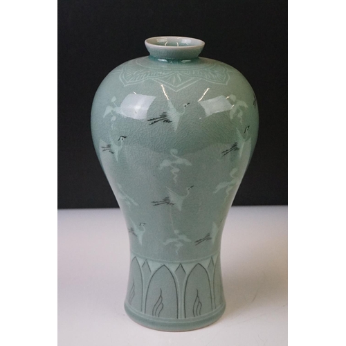 75 - Korean Goryeo Celadon Glazed Baluster Vase decorated with cranes and clouds (23cm high), together wi... 