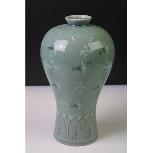 75 - Korean Goryeo Celadon Glazed Baluster Vase decorated with cranes and clouds (23cm high), together wi... 