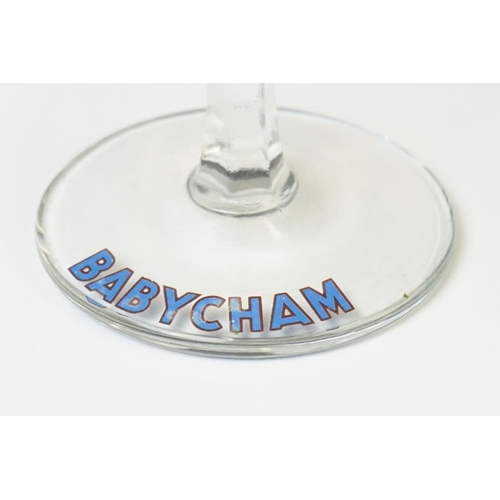 84 - Set of Six Babycham glasses, 10.5cm high, together with two plastic Babycham advertising figures (12... 