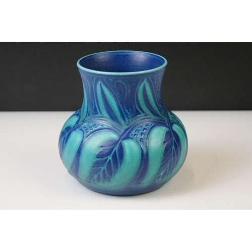 89 - Pilkington's Royal Lancastrian vase with blue glazed moulded wheatsheaf decoration, the vase of bulb... 