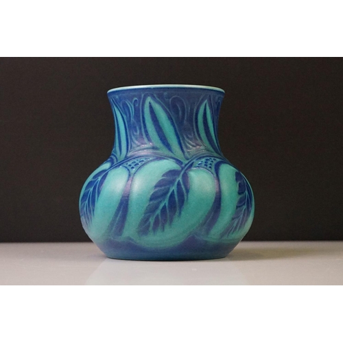 89 - Pilkington's Royal Lancastrian vase with blue glazed moulded wheatsheaf decoration, the vase of bulb... 