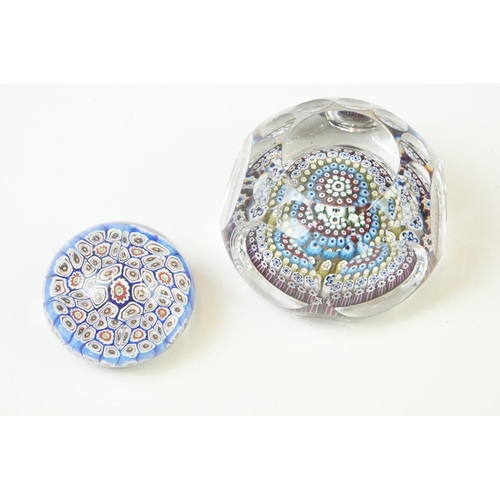 91 - Six 20th Century glass paperweights to include a faceted millefiori example, a Murano millefiori pap... 