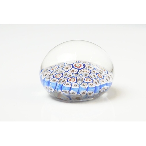 91 - Six 20th Century glass paperweights to include a faceted millefiori example, a Murano millefiori pap... 