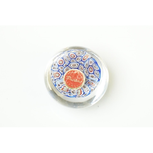 91 - Six 20th Century glass paperweights to include a faceted millefiori example, a Murano millefiori pap... 