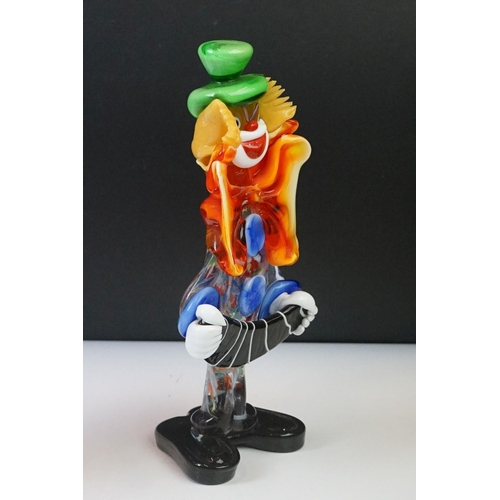 94 - Three Murano glass clowns, featuring an accordion player example (largest 28.5cm high), together wit... 