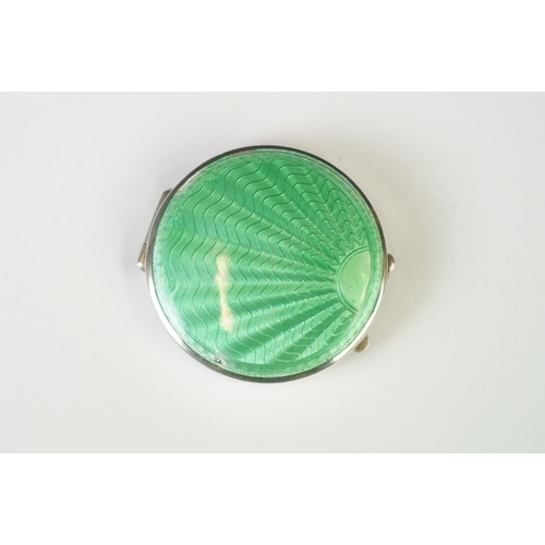 101 - A fully hallmarked sterling silver and enamel Art Deco powder compact with green guilloche decoratio... 