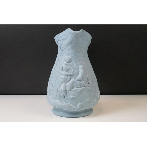 105 - Blue Stoneware Florence Nightingale jug, with relief moulded decoration depicting Florence Nightinga... 