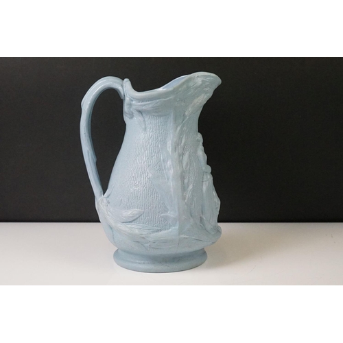 105 - Blue Stoneware Florence Nightingale jug, with relief moulded decoration depicting Florence Nightinga... 