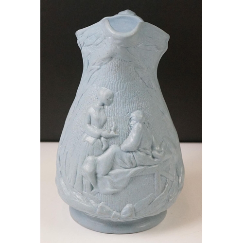 105 - Blue Stoneware Florence Nightingale jug, with relief moulded decoration depicting Florence Nightinga... 