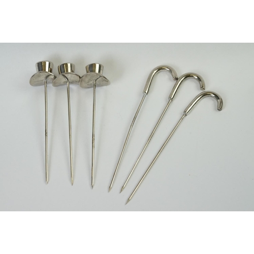 203 - Set of Six White Metal Cocktail Sticks in the form of Top Hats and Walking Sticks