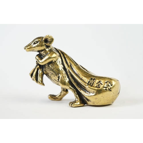 207 - An ornamental Solid brass lucky fortune rat with bag.