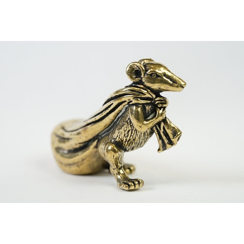 207 - An ornamental Solid brass lucky fortune rat with bag.