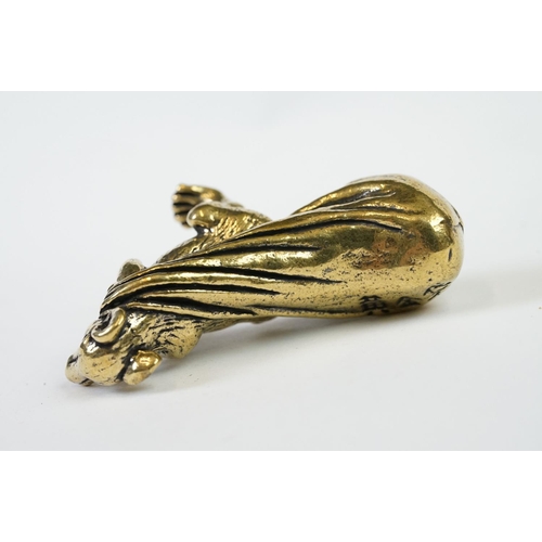 207 - An ornamental Solid brass lucky fortune rat with bag.