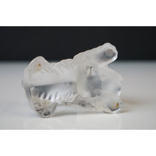 213 - A crystal ornament in the form of a Terrier dog at play, marked Crystal Sevres  France to the base.