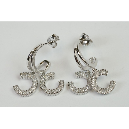 238 - Pair of Silver and CZ designer style Stud Earrings