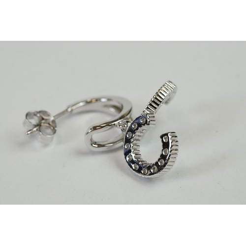 238 - Pair of Silver and CZ designer style Stud Earrings