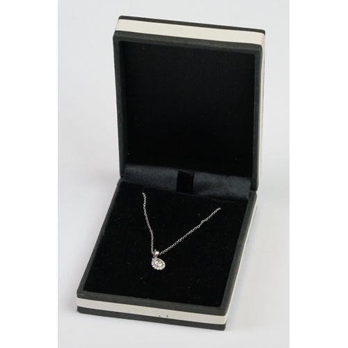 241 - 18ct White Gold Diamond Pendant of 25 points approx. total on gold chain