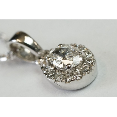 241 - 18ct White Gold Diamond Pendant of 25 points approx. total on gold chain