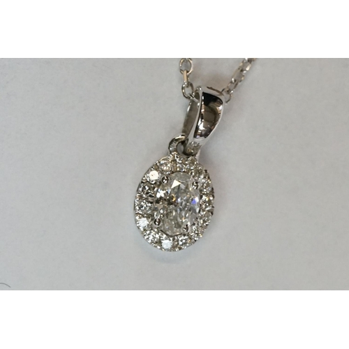 241 - 18ct White Gold Diamond Pendant of 25 points approx. total on gold chain