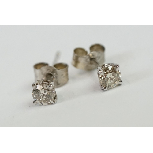 242 - Pair of 14ct White Gold Diamond Stud Earrings of 30 points approx. total