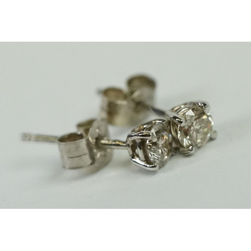 242 - Pair of 14ct White Gold Diamond Stud Earrings of 30 points approx. total