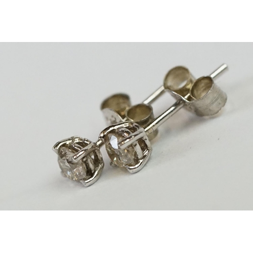 242 - Pair of 14ct White Gold Diamond Stud Earrings of 30 points approx. total