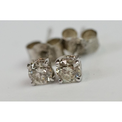 242 - Pair of 14ct White Gold Diamond Stud Earrings of 30 points approx. total