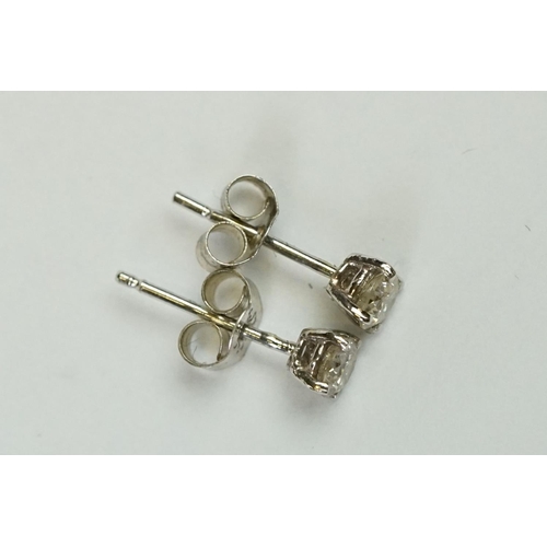 242 - Pair of 14ct White Gold Diamond Stud Earrings of 30 points approx. total