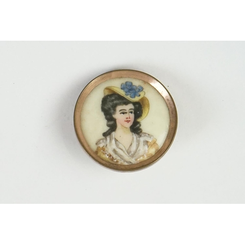 214 - A small collection of antique buttons to include portrait examples.