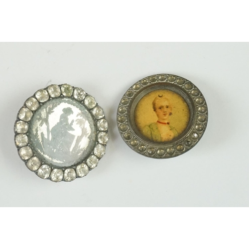 214 - A small collection of antique buttons to include portrait examples.