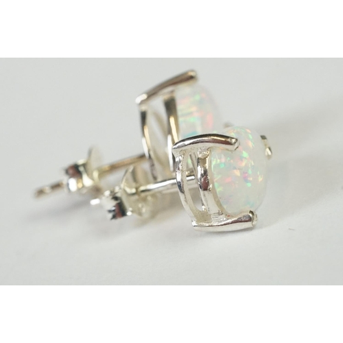 260 - Pair of Pear shaped Silver and Opal Stud Earrings