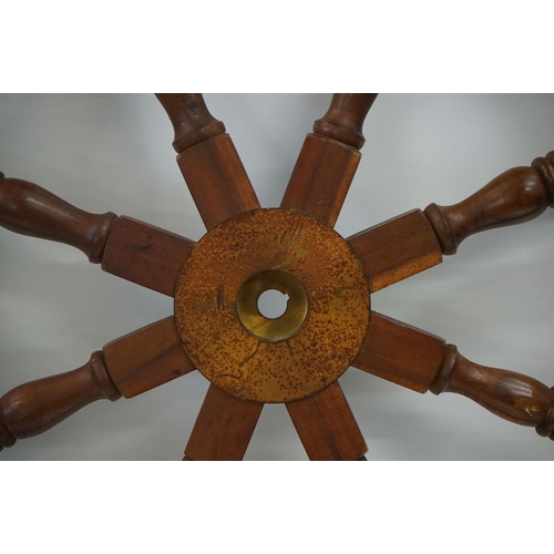 24 - Large Wooden Eight Spoke Ships Wheel with central metal fitting and turned wooden exterior handles, ... 