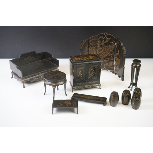 269 - A collection of ebonised Chinese dolls house furniture to include screen, tables, stools...etc.