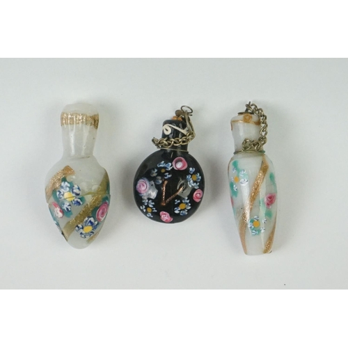 277 - A collection of three miniature oriental glass scent bottle with hand painted decoration.