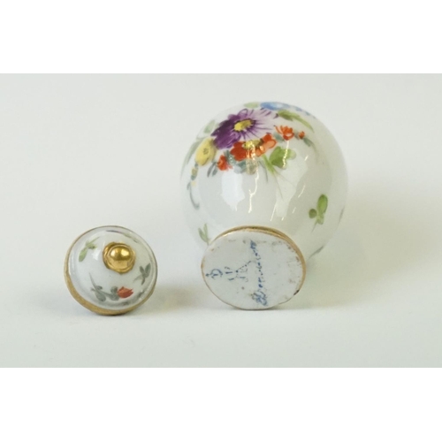 278 - A miniature hand painted porcelain lidded vase, marked Dresden to base.