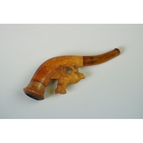 279 - An antique meerschaum pipe with carved dog within original fitted case.