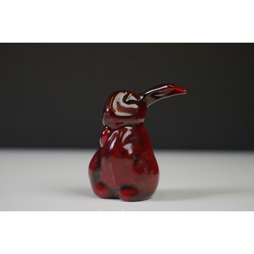 281 - A Royal Doulton Flambe one eared rabbit ceramic figure, stands approx 6cm in height.