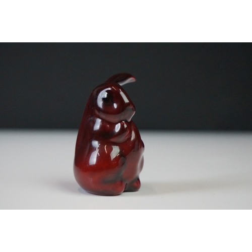 281 - A Royal Doulton Flambe one eared rabbit ceramic figure, stands approx 6cm in height.