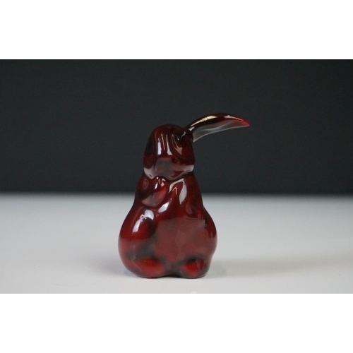 281 - A Royal Doulton Flambe one eared rabbit ceramic figure, stands approx 6cm in height.