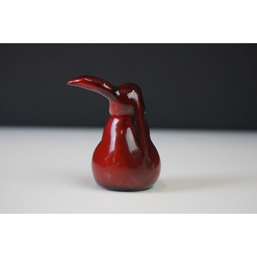 281 - A Royal Doulton Flambe one eared rabbit ceramic figure, stands approx 6cm in height.